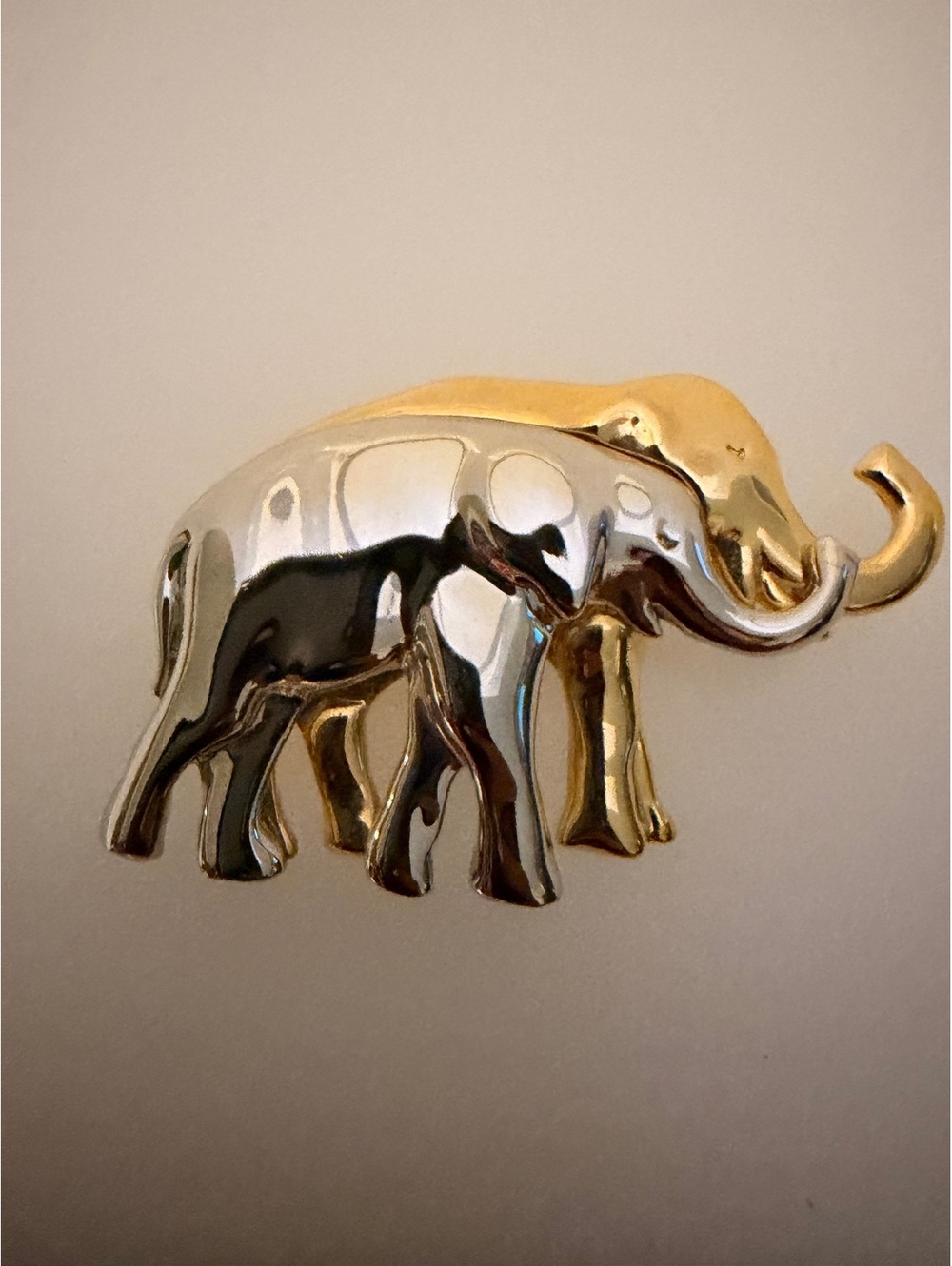 Gold and silver tone elephant brooch